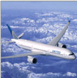 a plane flying over the mountains