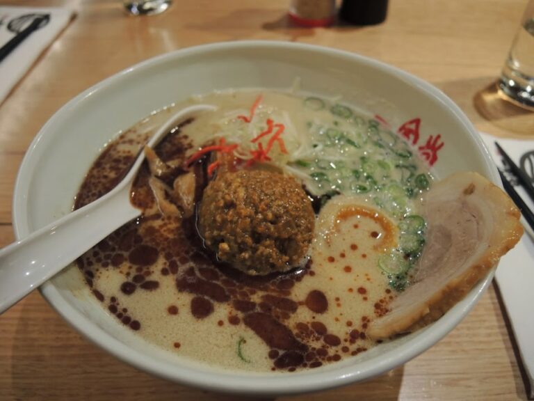 a bowl of soup with a spoon