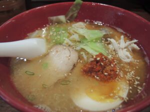a bowl of soup with a spoon