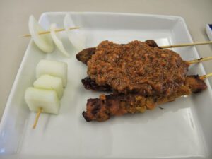 a plate of food on a white plate