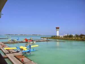 a group of airplanes on a dock