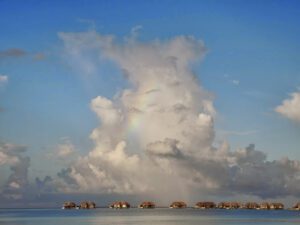 a group of houses in the water