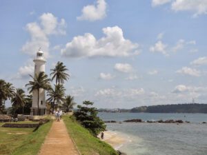 a lighthouse on a beach