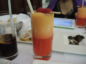 a glass with a drink in it