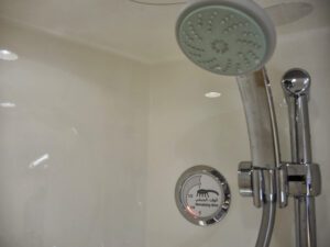 a shower head in a bathroom