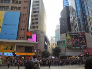 a group of people walking in Times Square