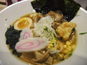 a bowl of food with various toppings