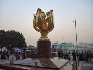a large gold statue on a pedestal
