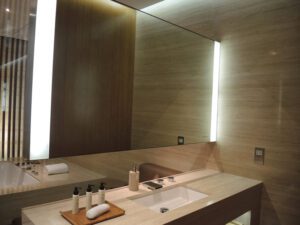 a bathroom with a large mirror