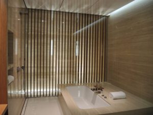 a bathroom with a bathtub and a shower