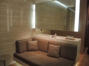 a brown couch in a bathroom