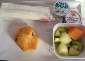 a tray of fruit and pastry