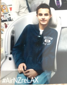 a boy sitting in a chair