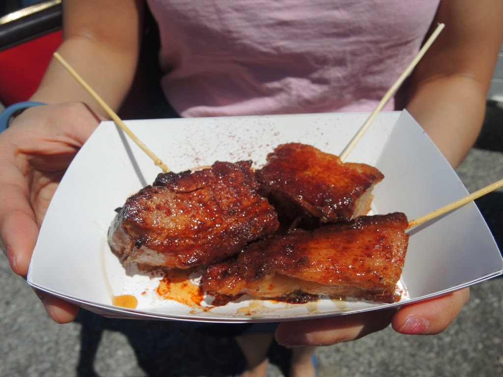 a person holding a plate of food