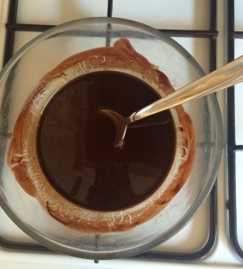 a spoon in a glass cup