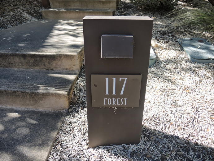 a sign on a post