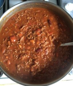 a pot of food with a spoon