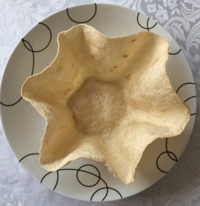 a tortilla shell on a plate