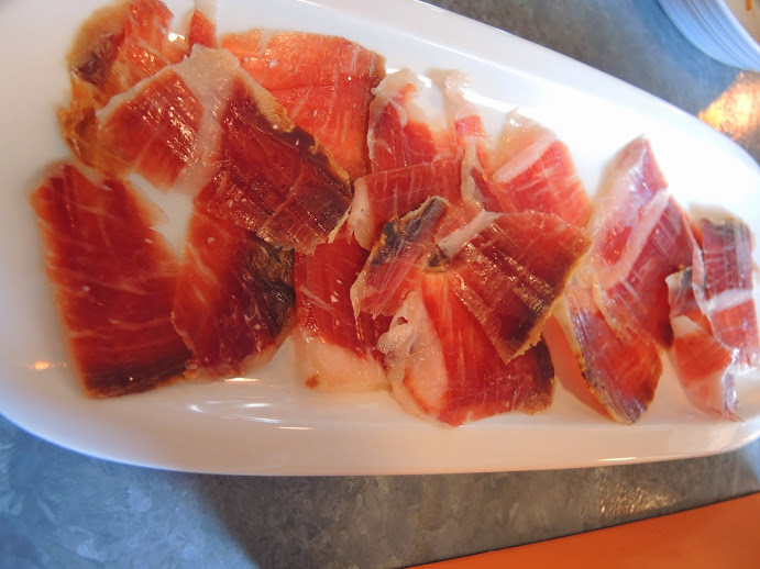 a plate of meat on a counter