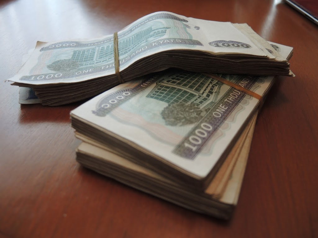 a stack of money on a table