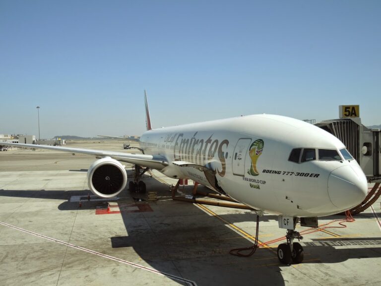 a white airplane on a tarmac