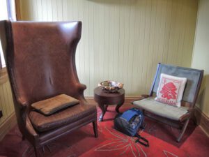 a chair and a bag in a room