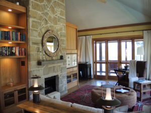 a living room with a fireplace and a couch