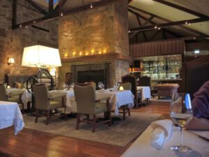 a restaurant with tables and chairs