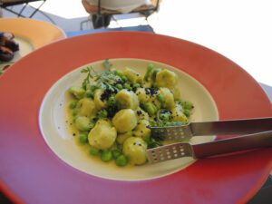 a plate of food with tongs