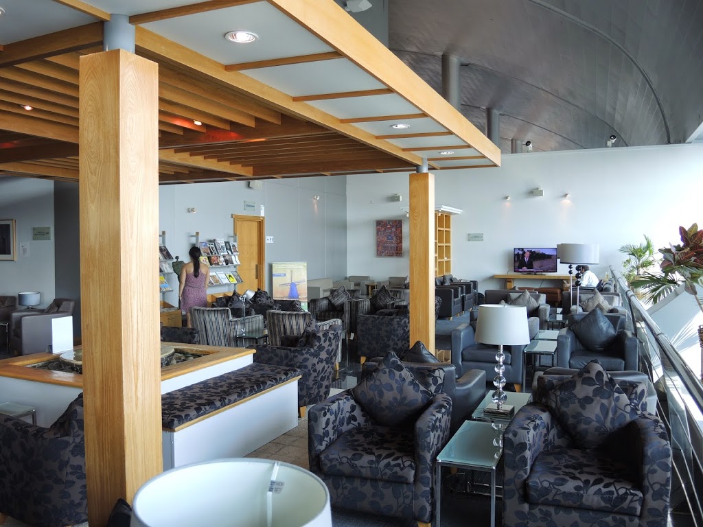 a room with couches and chairs
