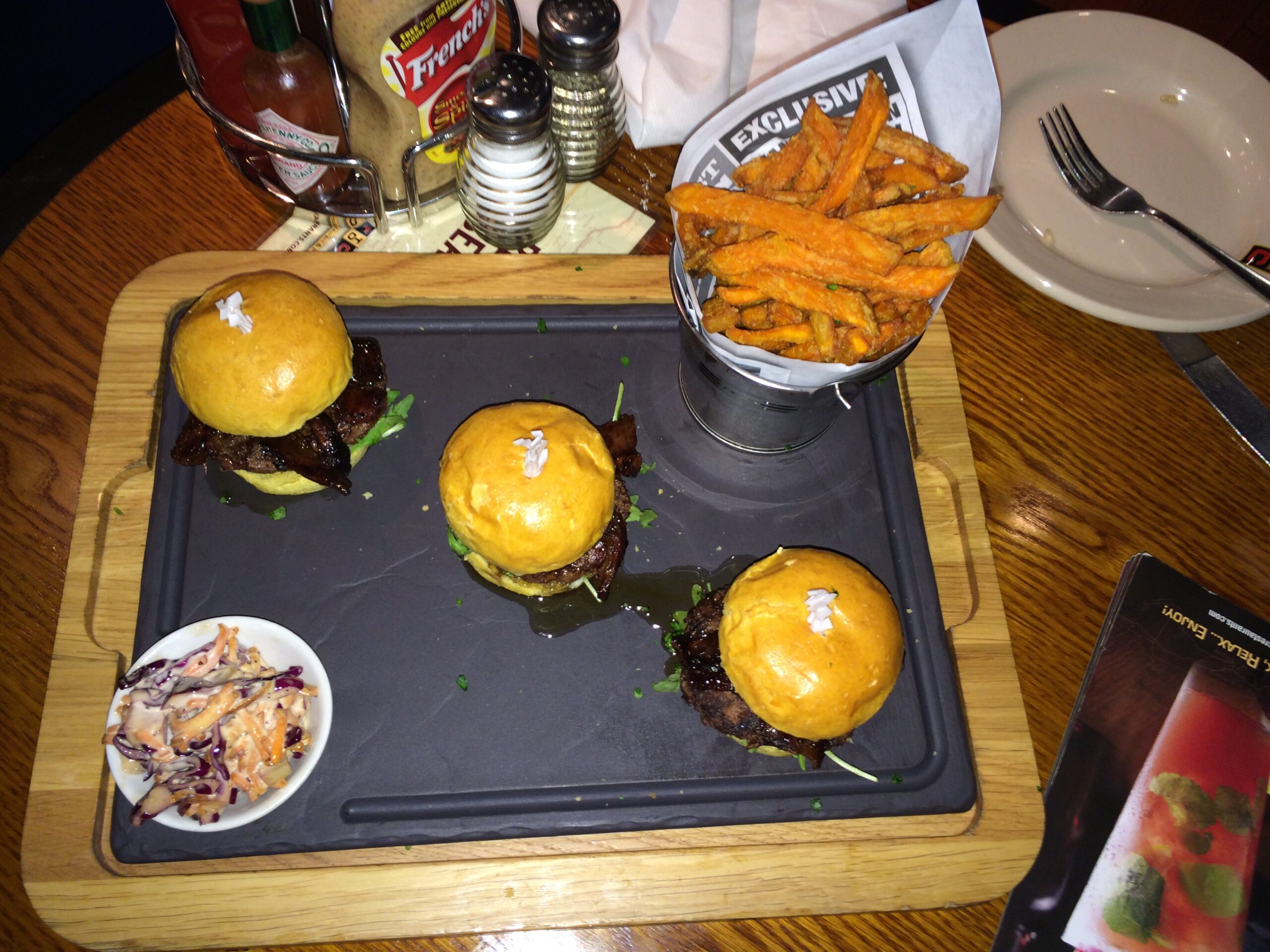 a tray of burgers and fries