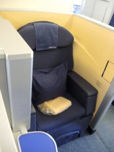 a seat with a pillow on it