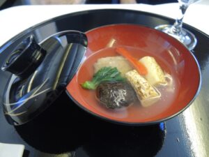 a bowl of soup with vegetables