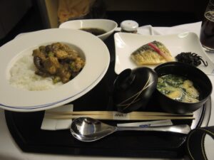 a plate of food on a tray