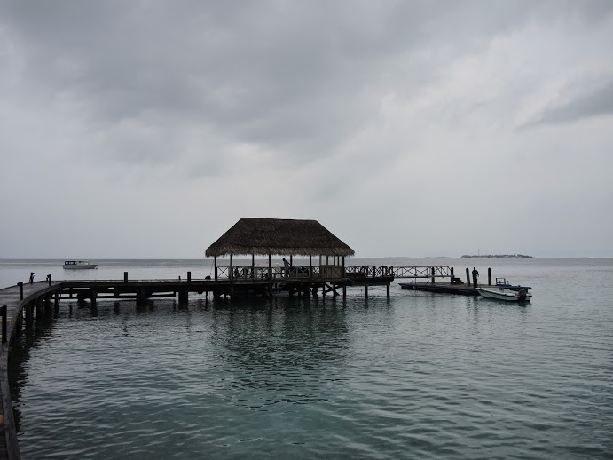a dock with a hut on it