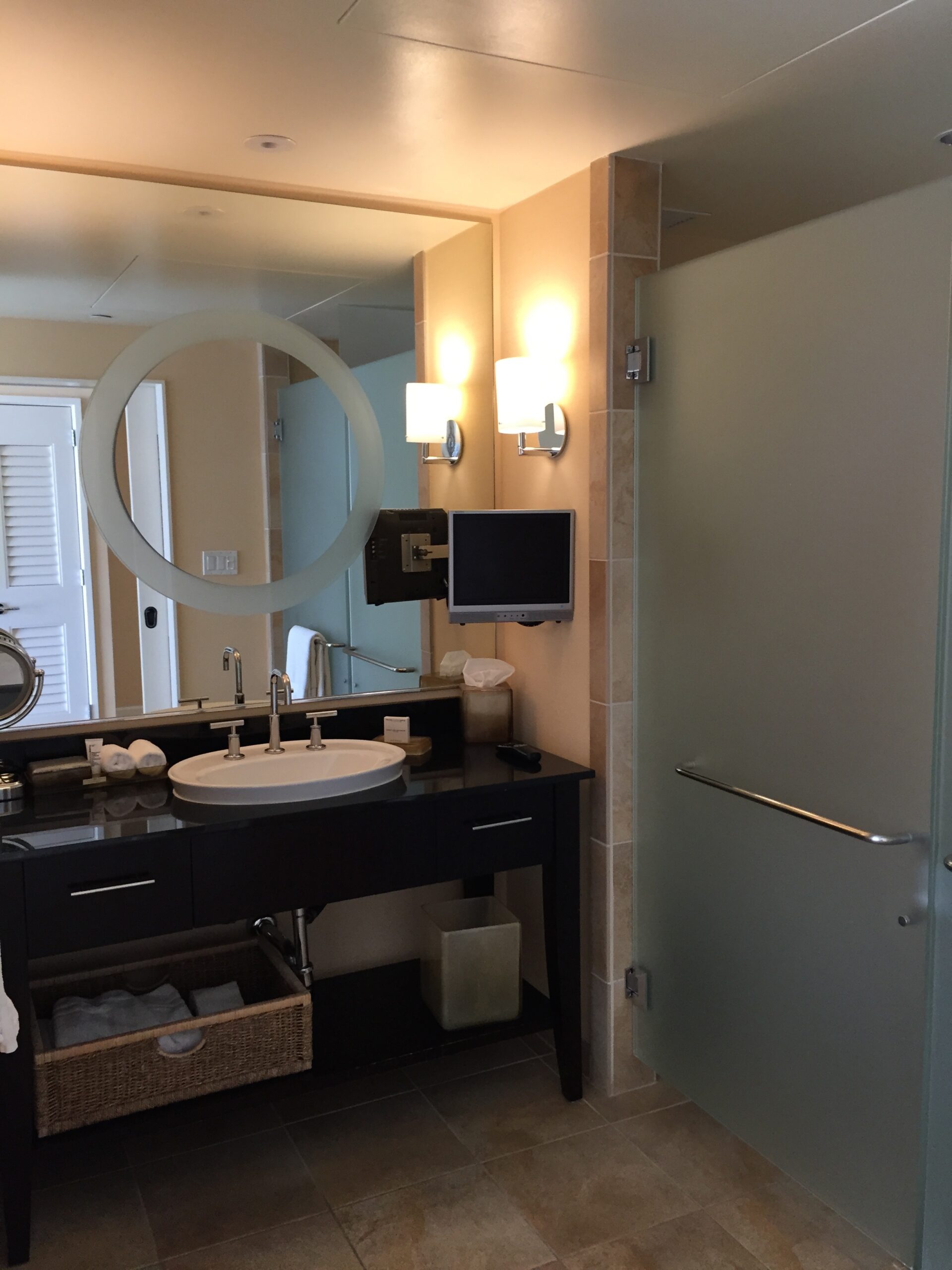 a bathroom with a mirror and sink