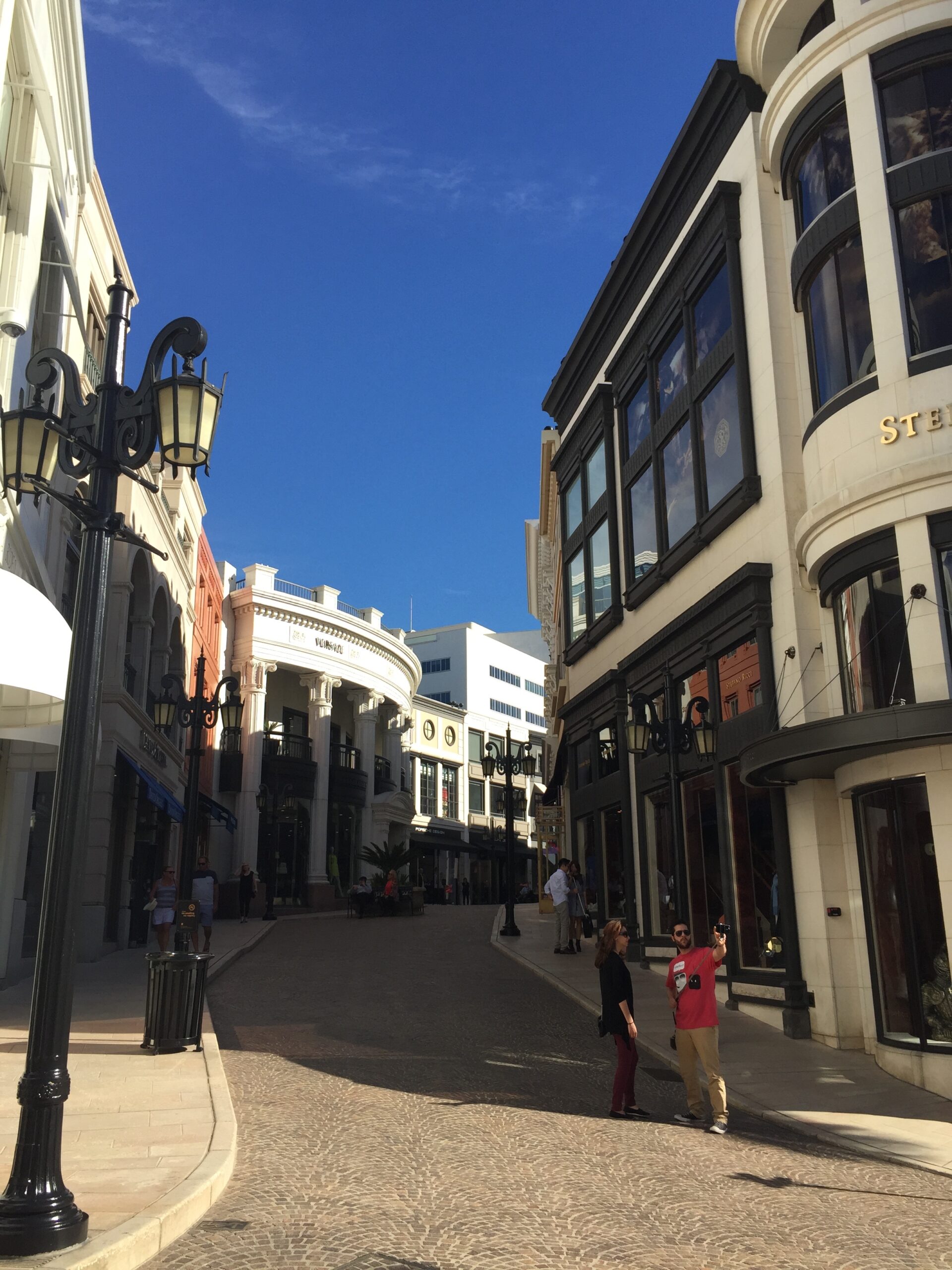 a street with buildings and people on it