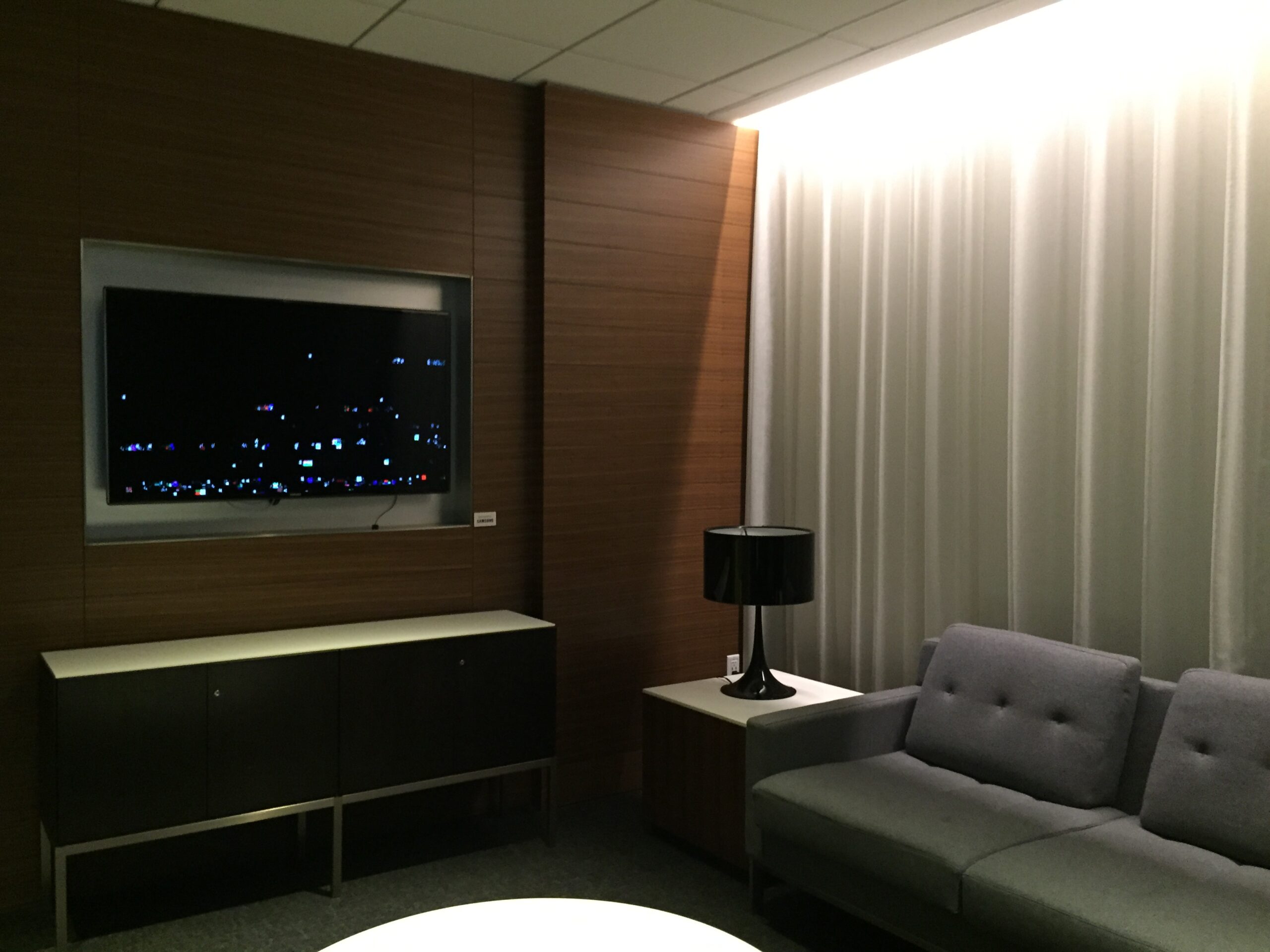 a room with a couch and a tv