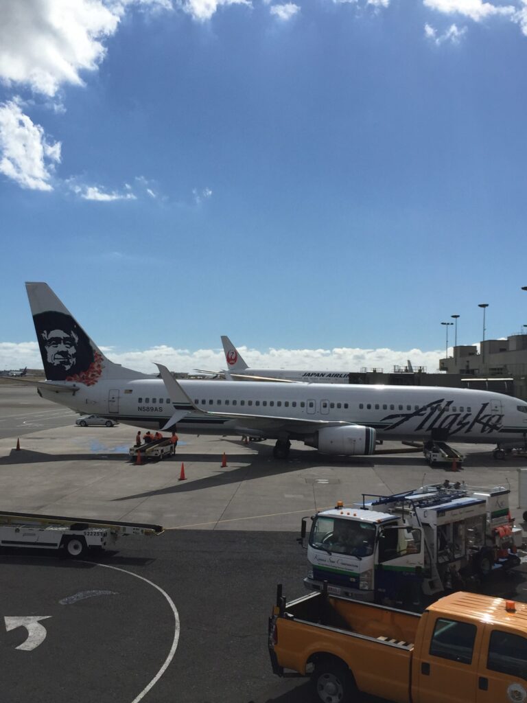 a white airplane on a tarmac