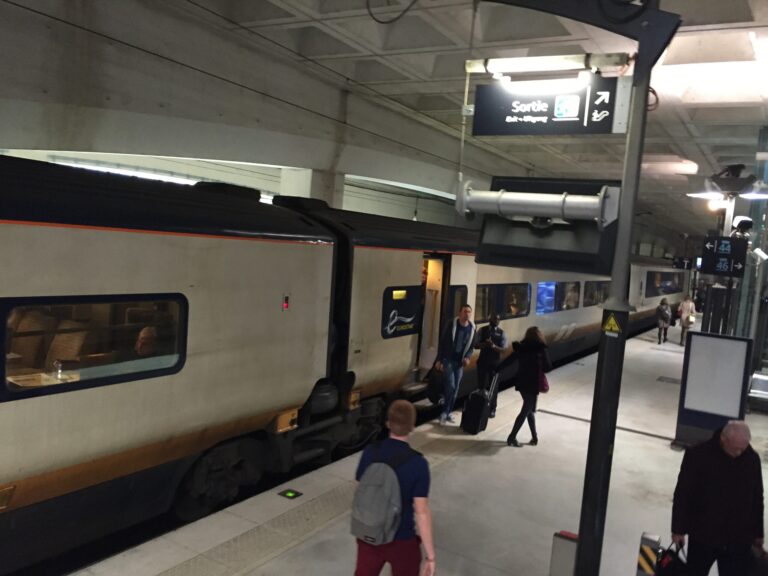 people walking on a train station