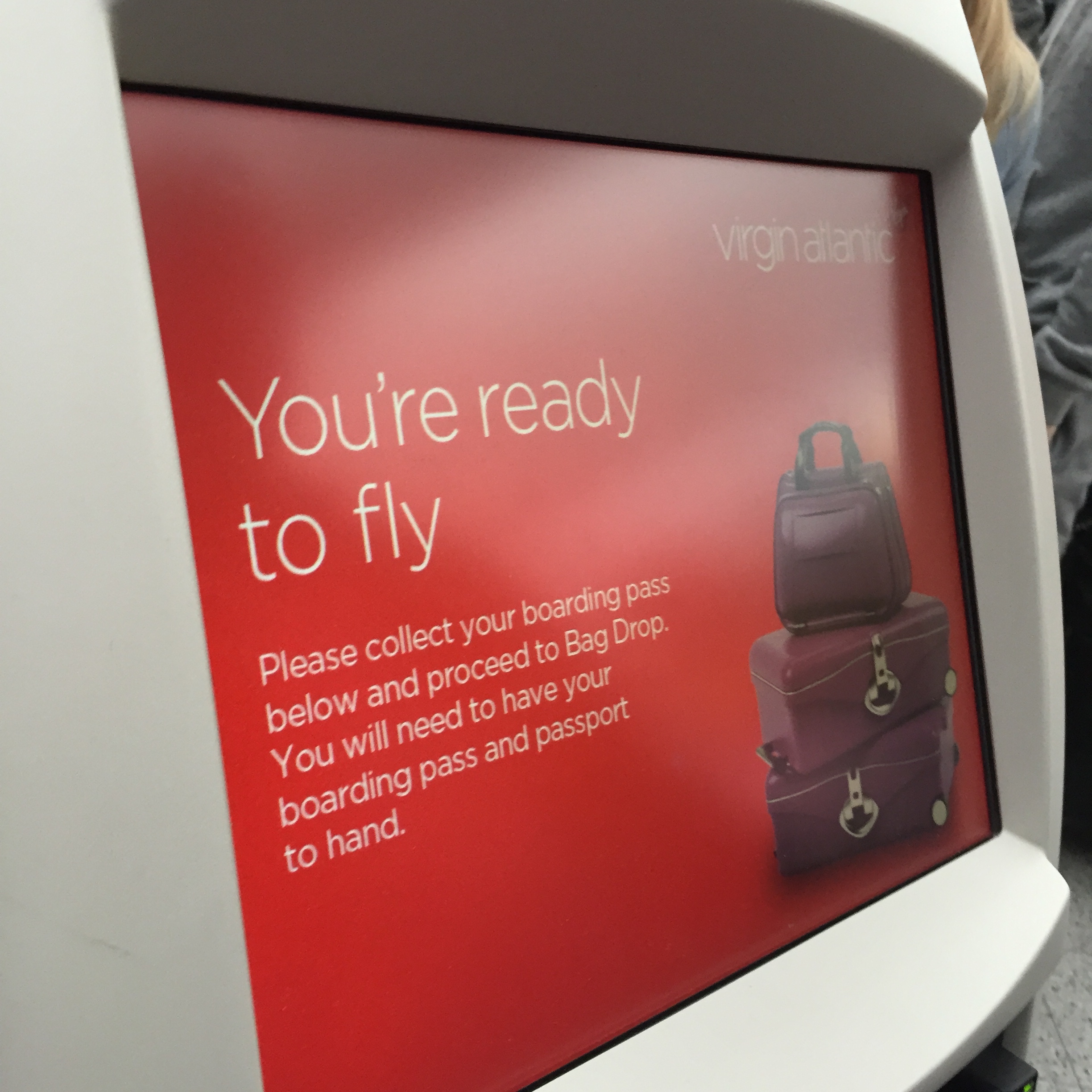 a screen with a red and white sign