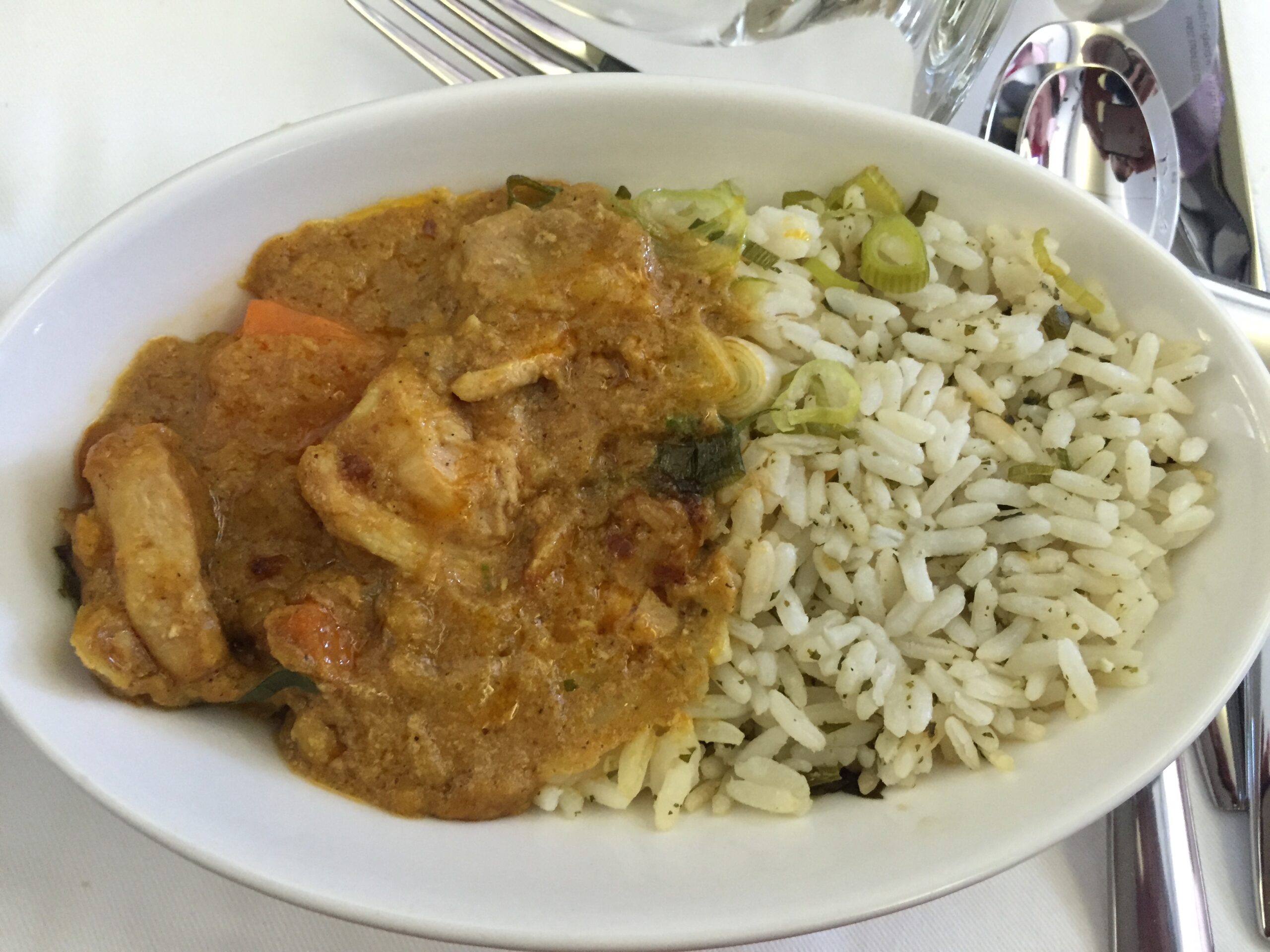 a plate of rice and meat