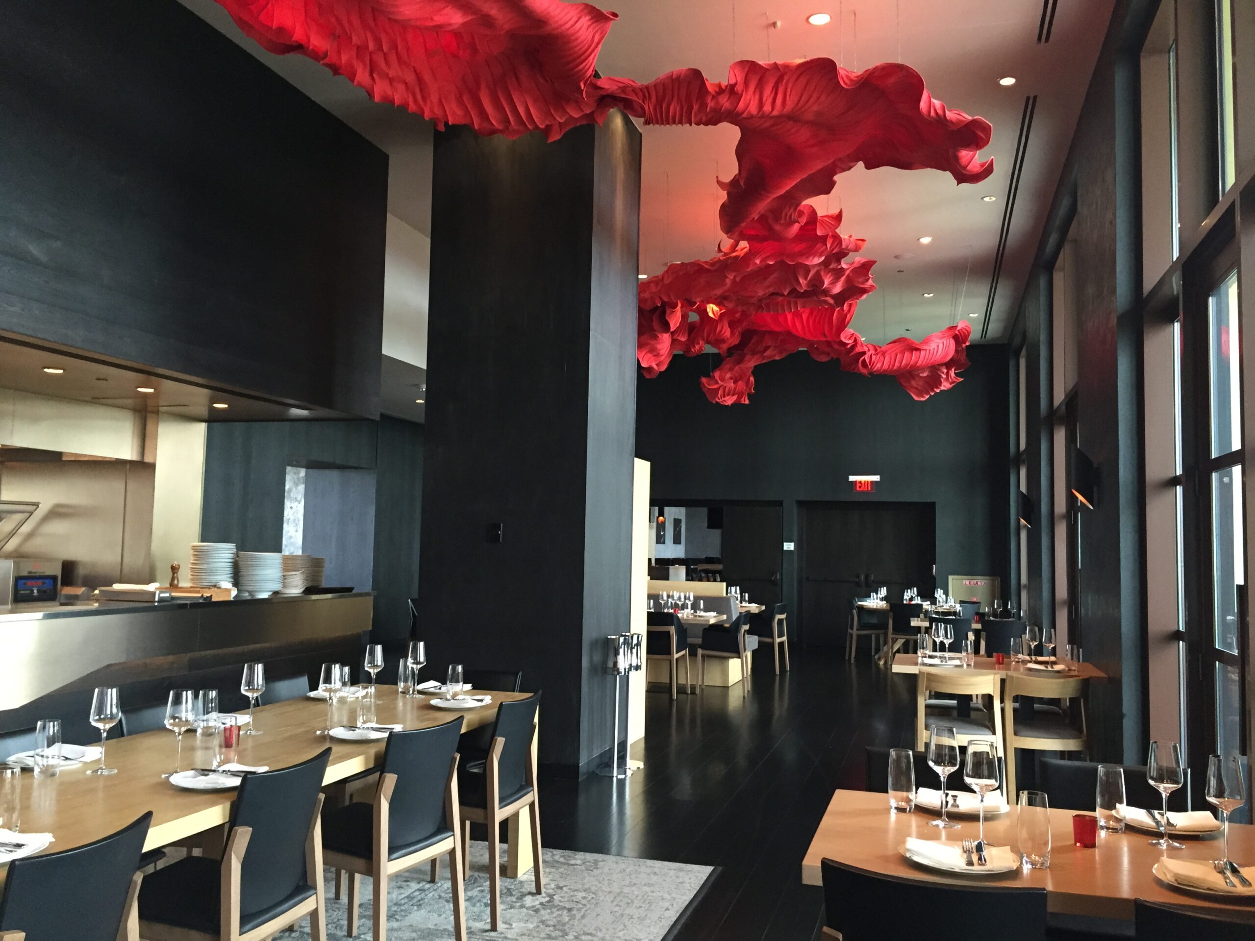 a restaurant with tables and chairs