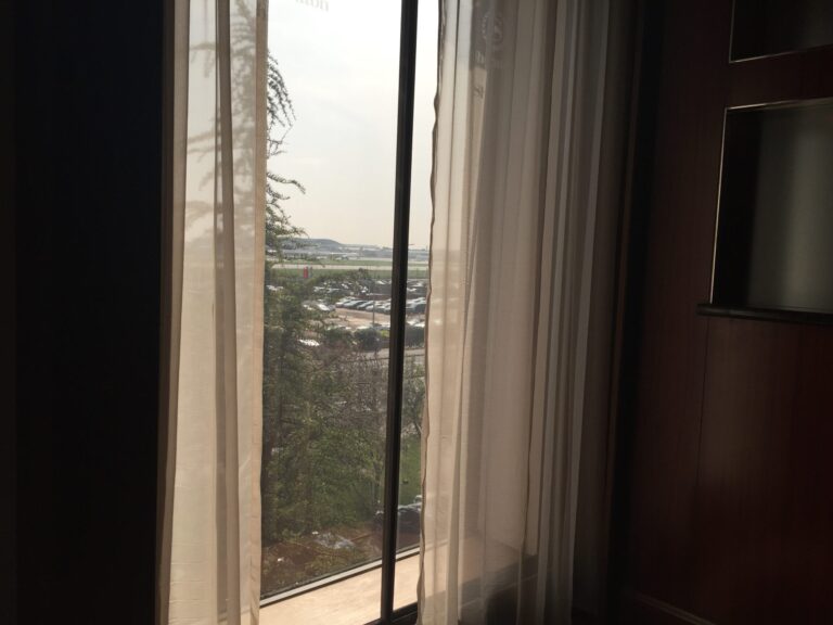 a window with white curtains