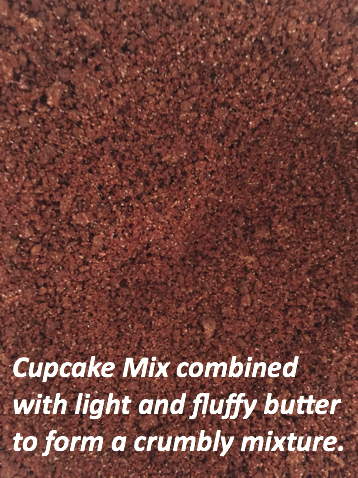a close up of a pile of brown powder