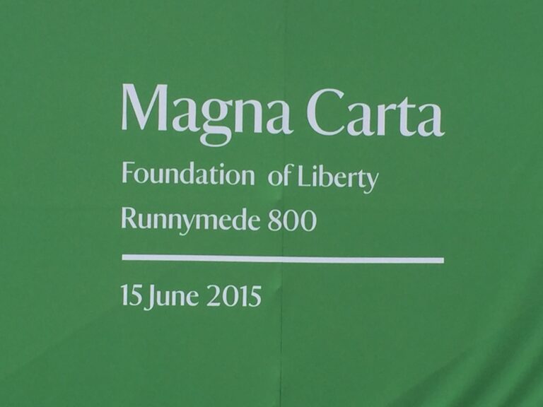 a green sign with white text