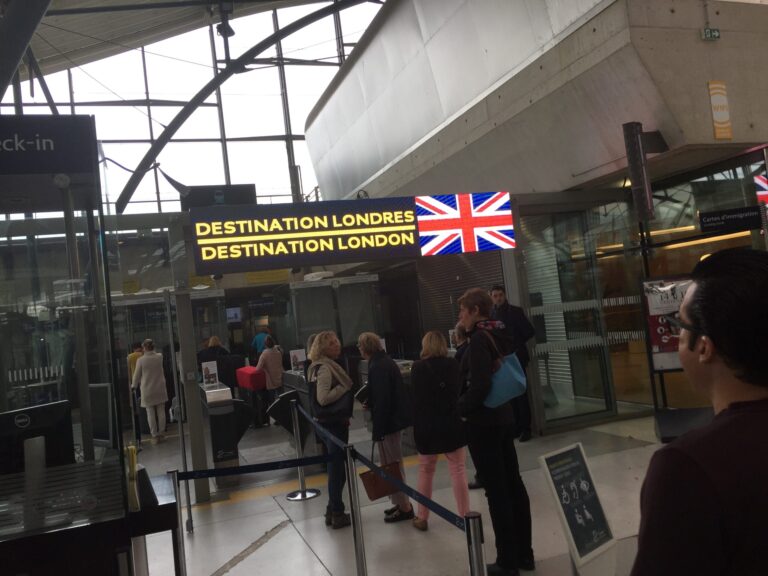 people standing in line at a airport