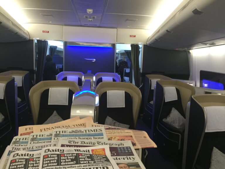a plane with a few newspapers on it