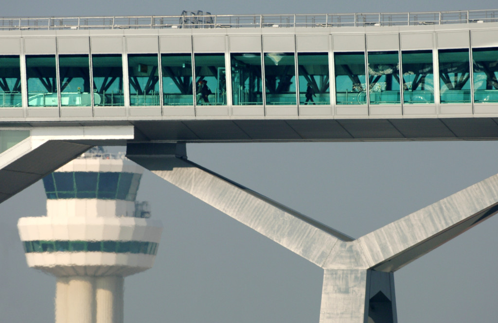 a bridge with people walking on it