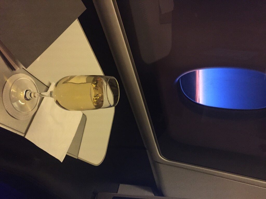 a glass of wine on a table